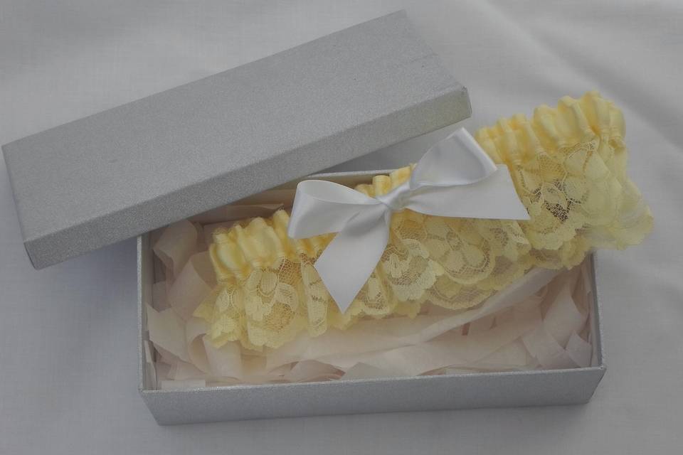 Wedding garters in a gift box