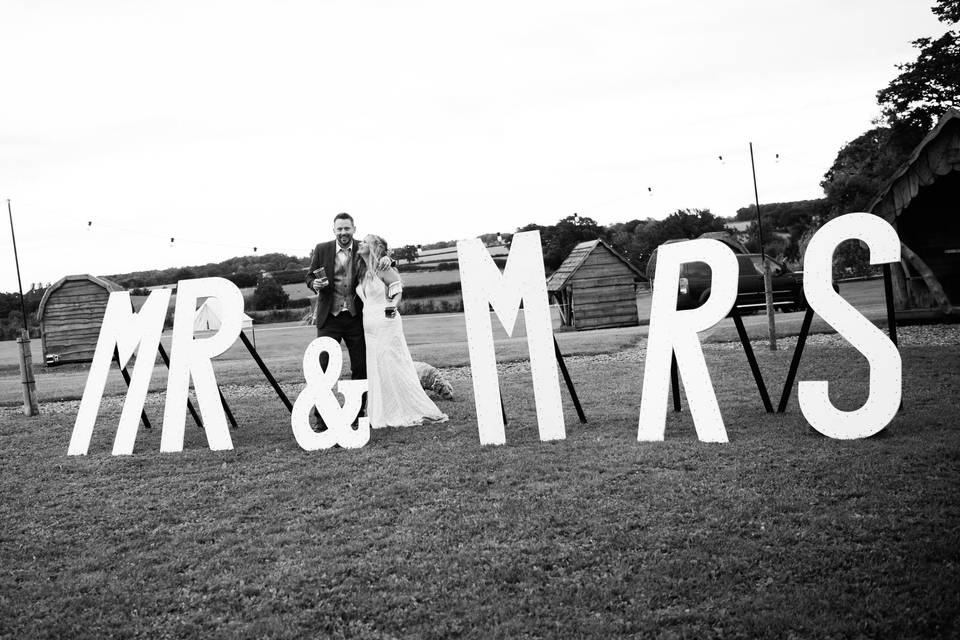 Couple and large sign