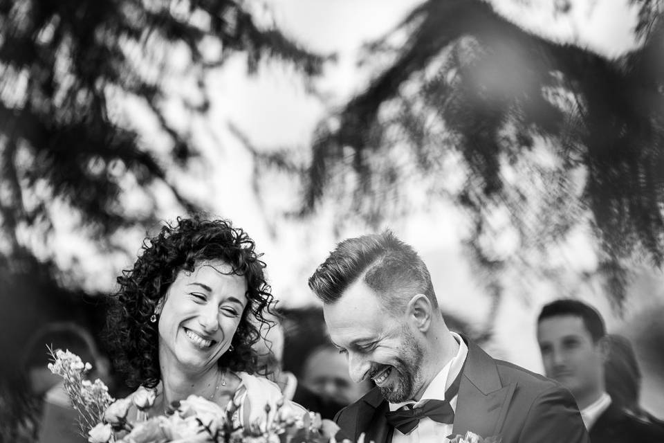 Bride and groom laughing