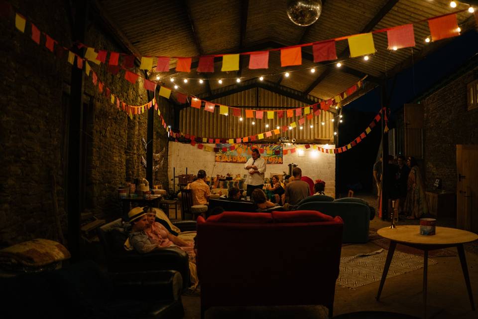 Bunting, sofas, and disco ball