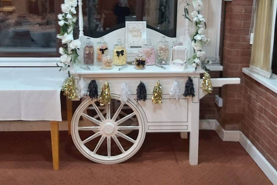 Traditional white sweet cart