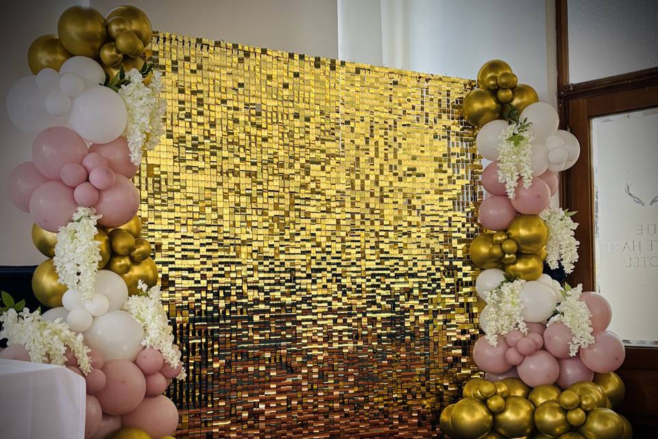 Gold shimmer wall with balloon