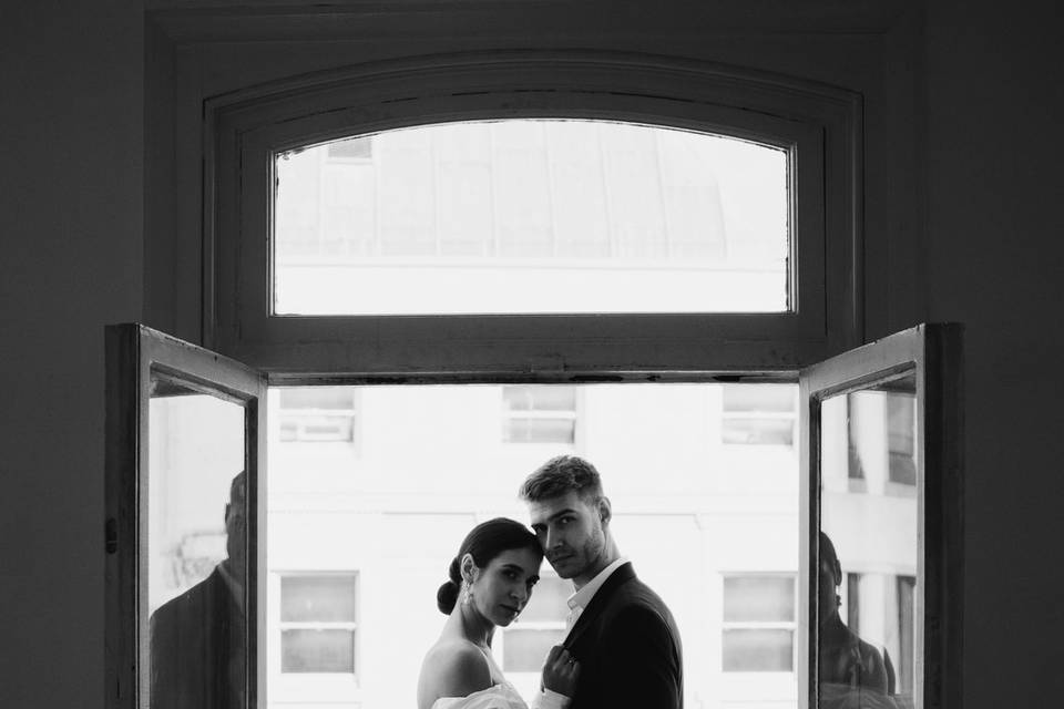 Couple portrait by doorway