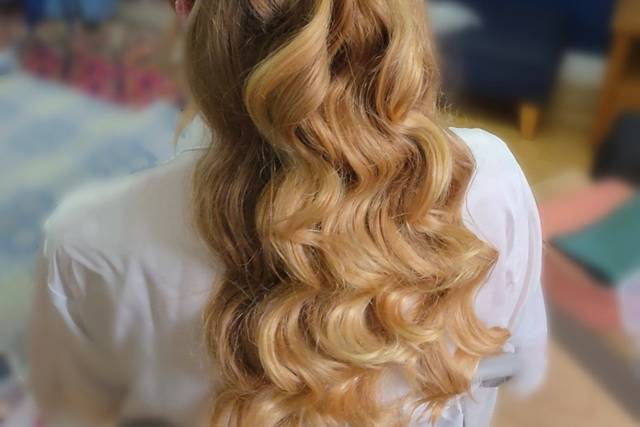 Half-down sleek waves hair