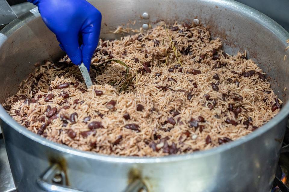 chef mixing rice and beans
