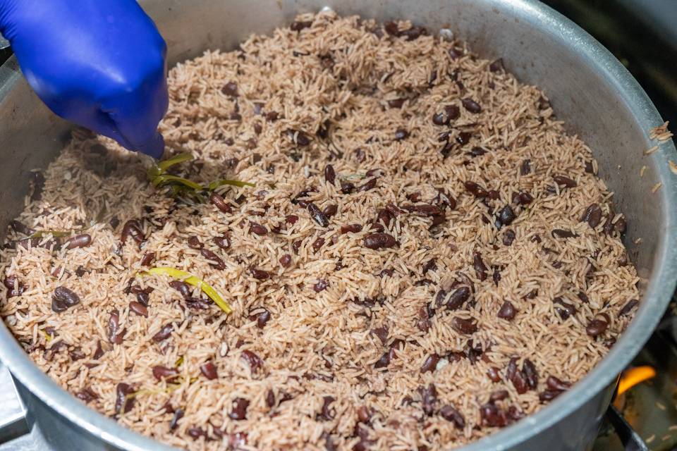 mixing rice and peas in large pot