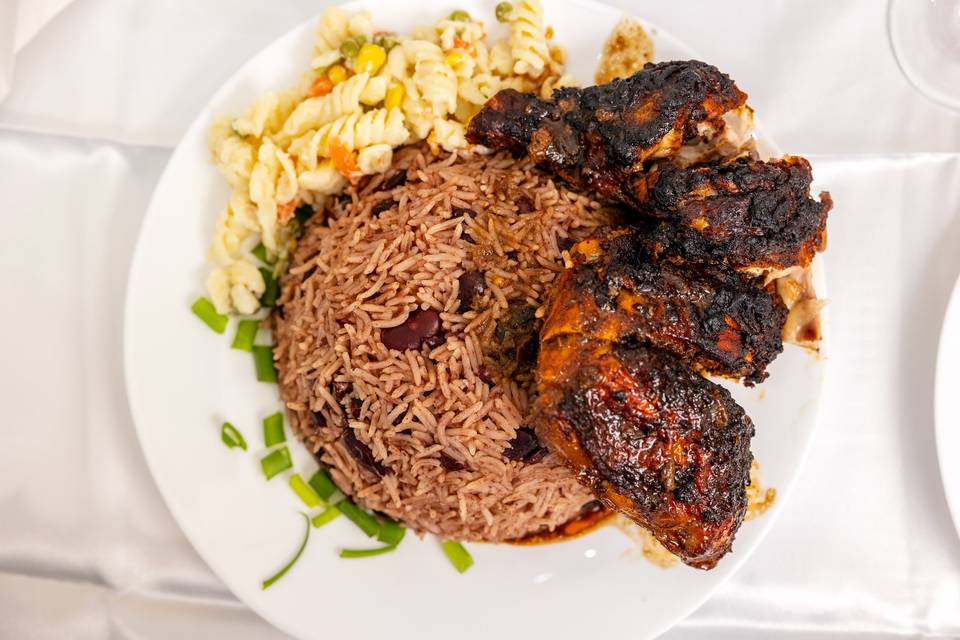 plated rice beans jerk chicken
