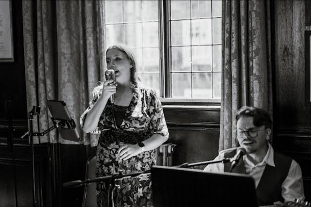 Us singing at a ceremony