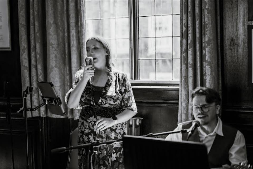 Us singing at a ceremony