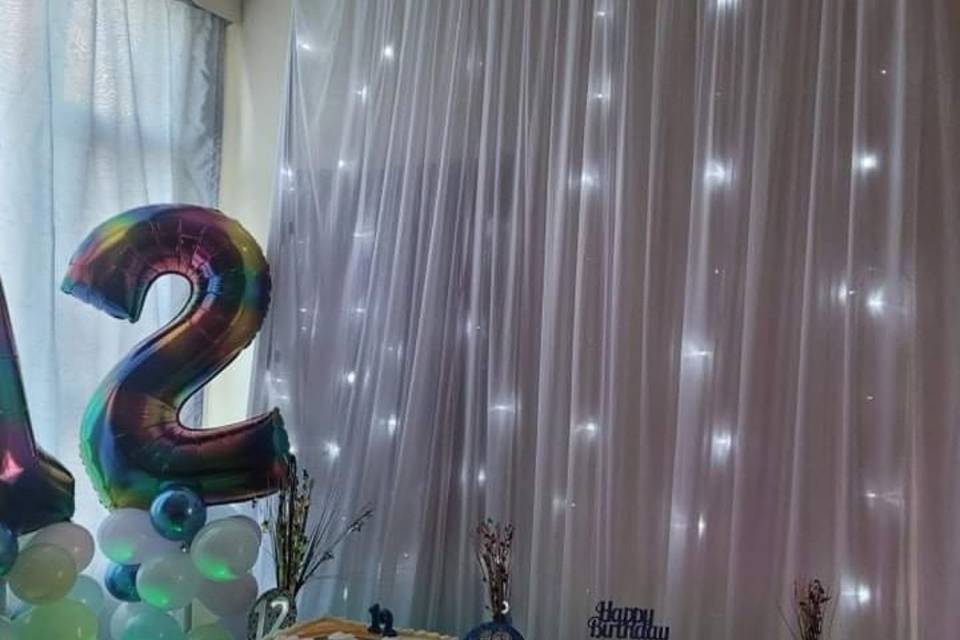 Birthday set up with backdrop