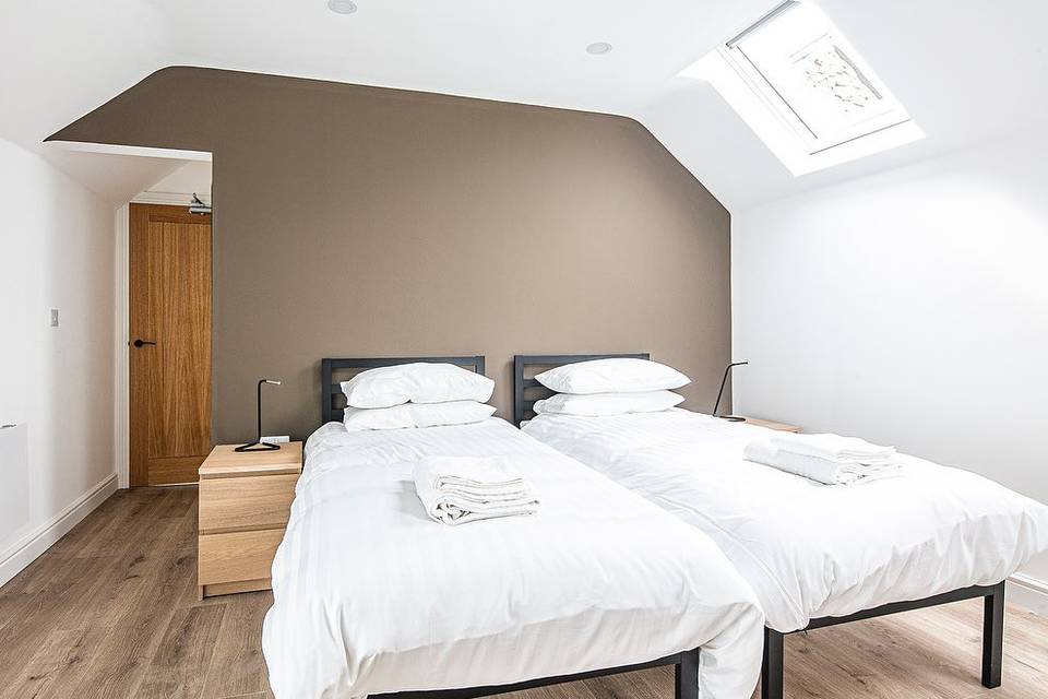 Bedroom with white linens