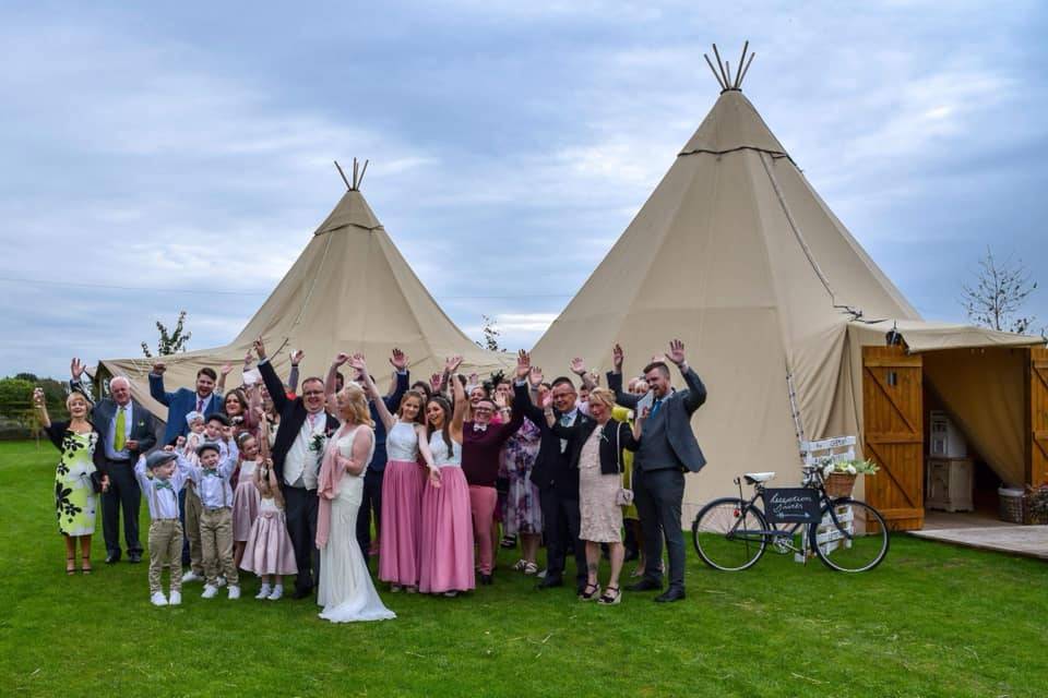 Double hat with guests outside