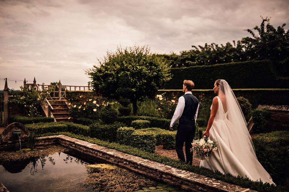 Couple in formal gardens