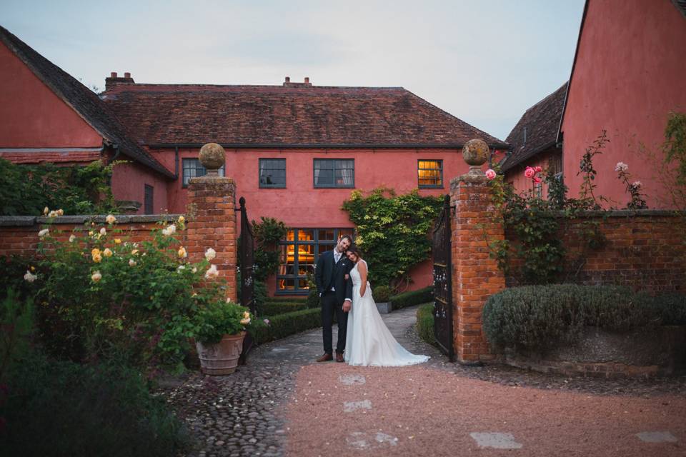 Couple in front of main house
