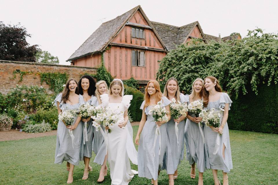 Bridesmaids on lawn