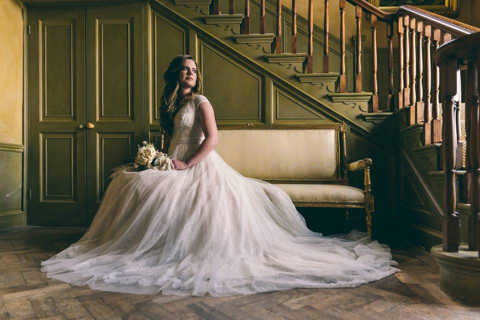 Bride beneath main stairs