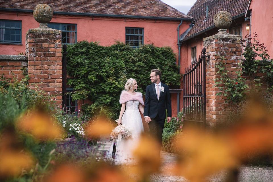 Couple in front of main house