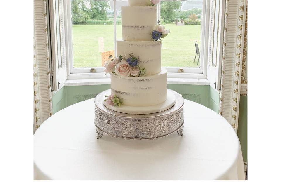 4 tier semi naked wedding cake