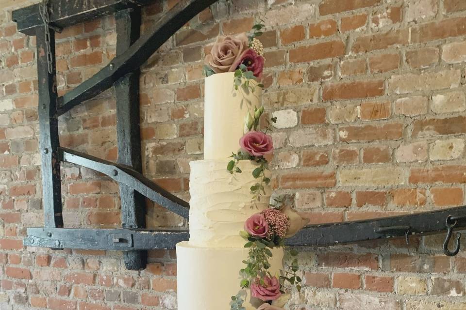 4 tier buttercream iced cake