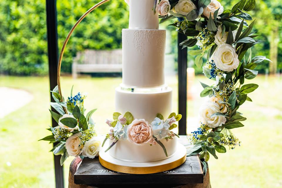 Pastel sugar flowers wedding cake