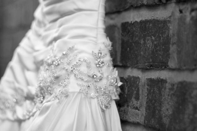 A hanging up wedding dress