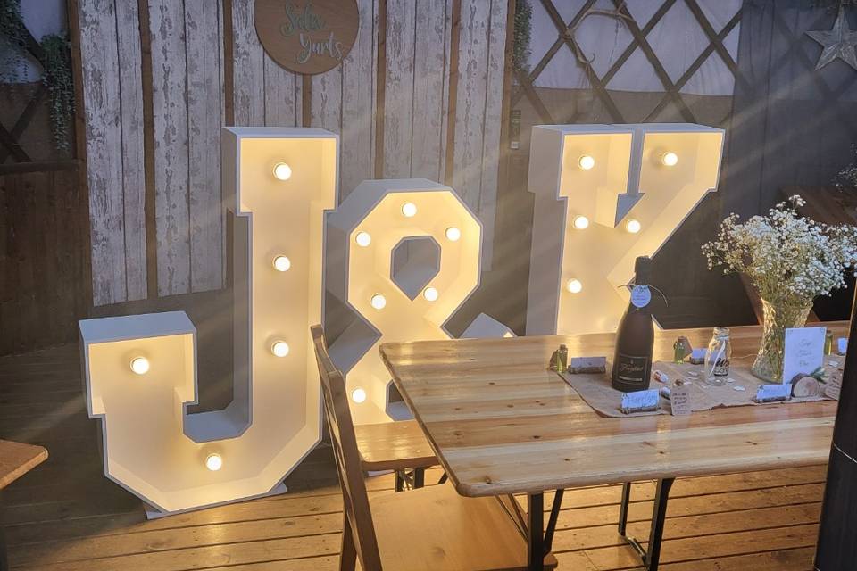 Initials in yurt wedding