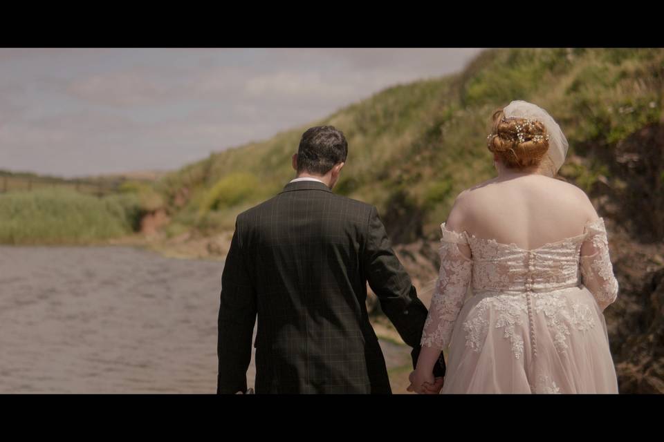 Bride and groom at beach