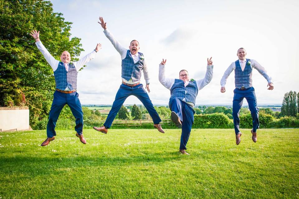 Jumping groomsmen