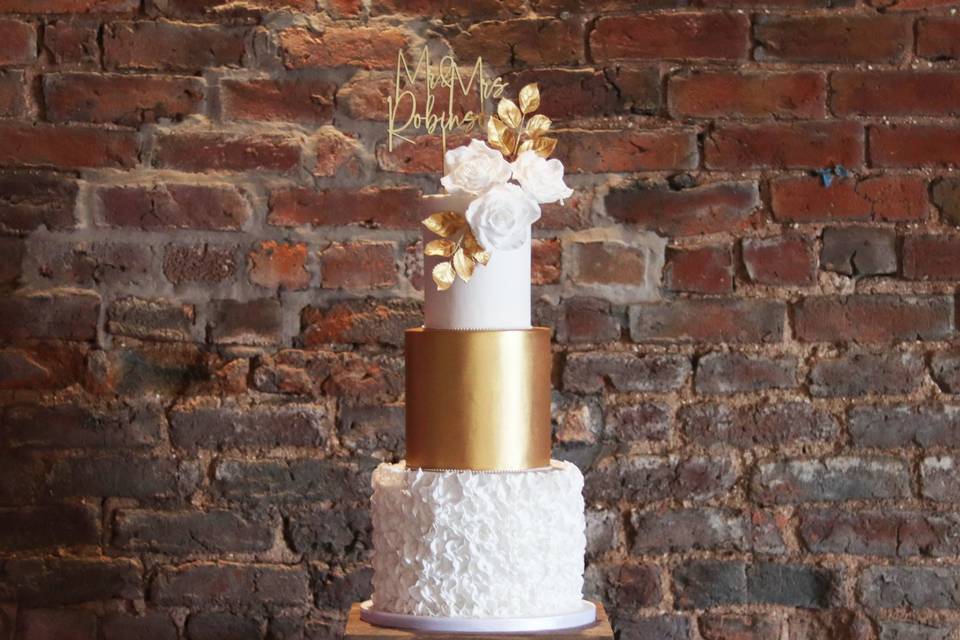 Gold ruffle wedding cake