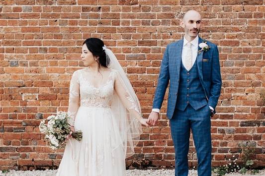 Gorgeous brides in vineyard