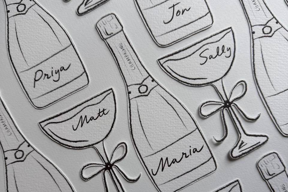 Champage and couple placecards