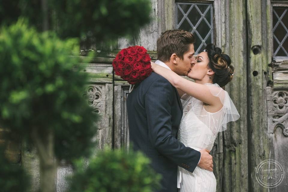 Newlyweds kissing