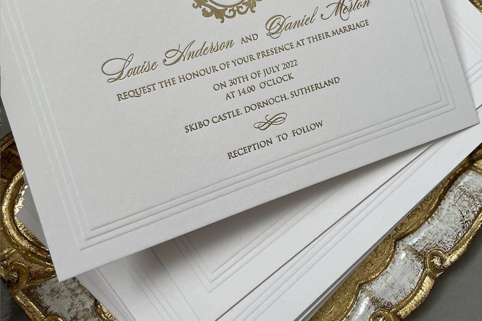 Embossed gold foil invitations
