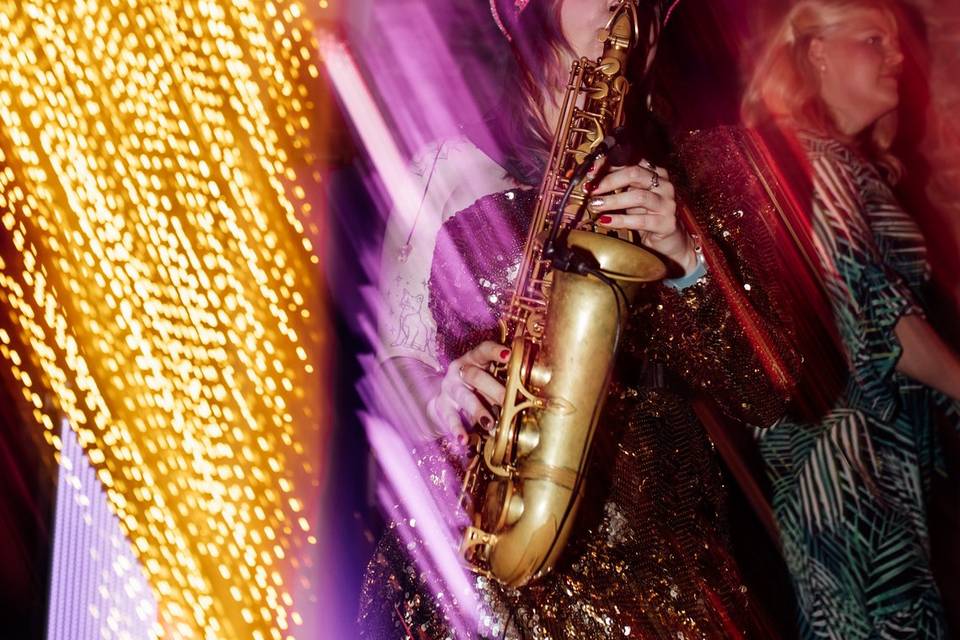 Sax player bringing the party