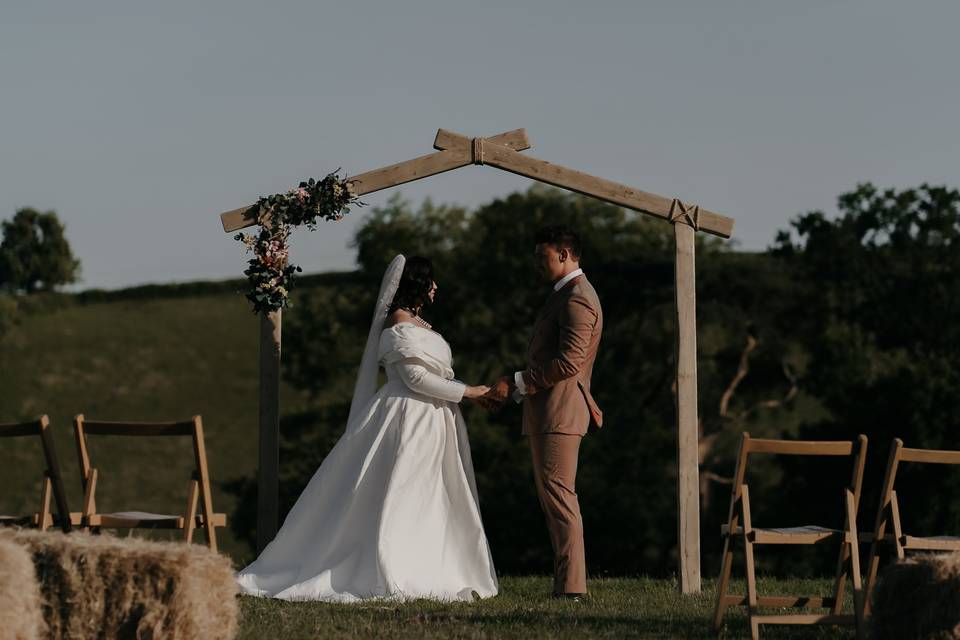 Bride and Groom under arch