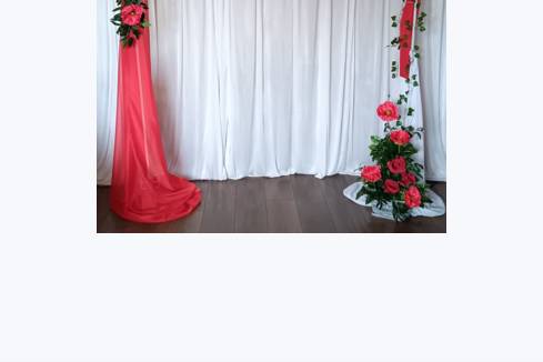 Red arch with florals & fabric