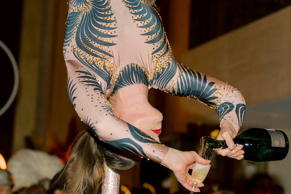 Aerialist champagne pour - wedding entertainment