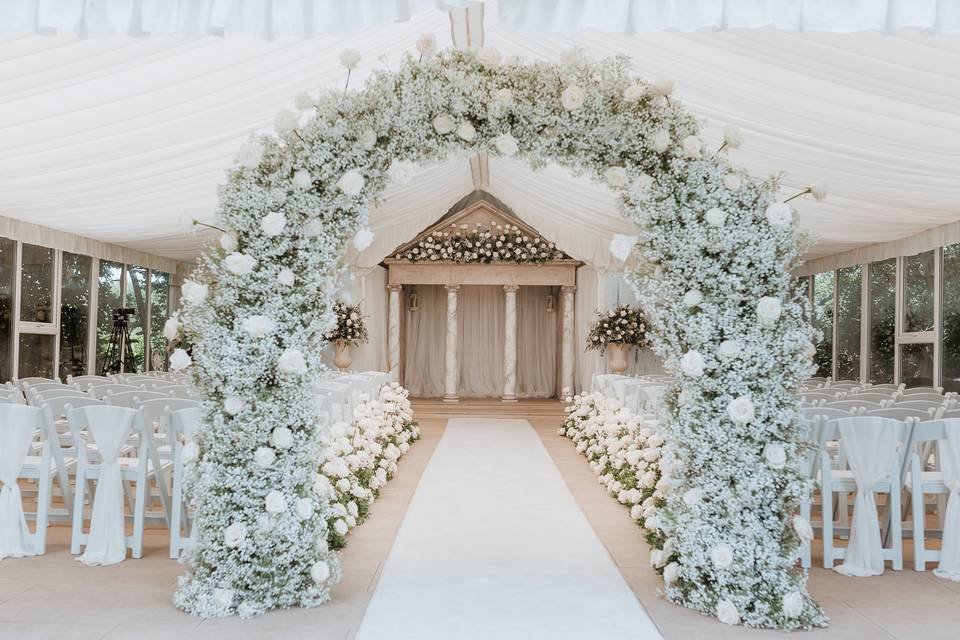 Roses in the ceremony marquee