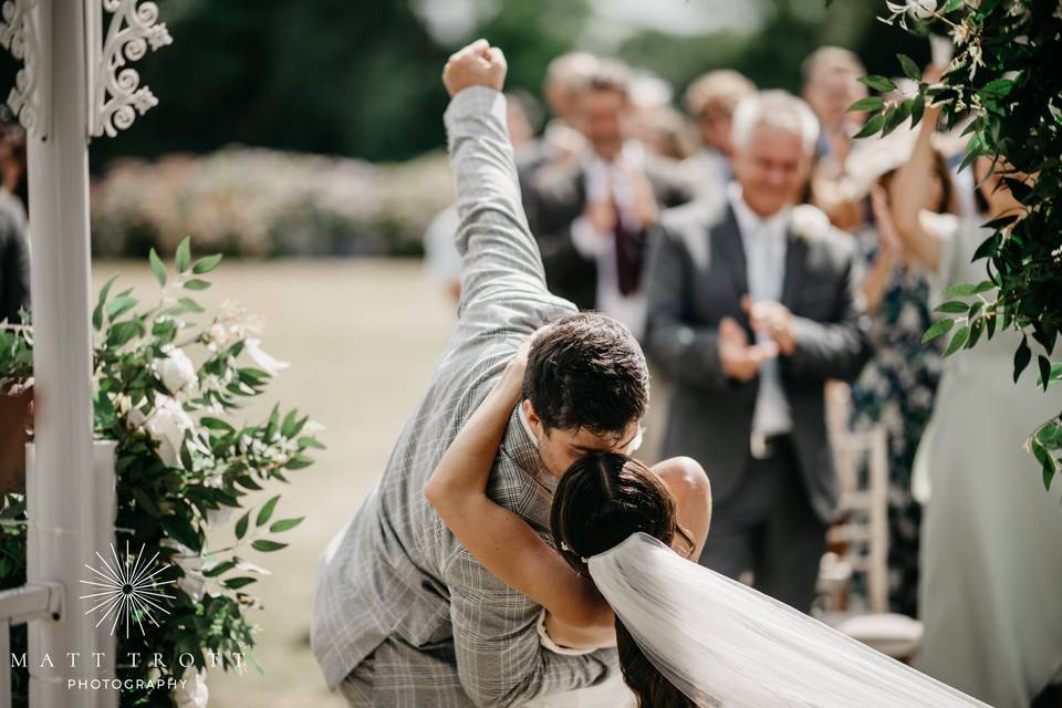 Groom punching air