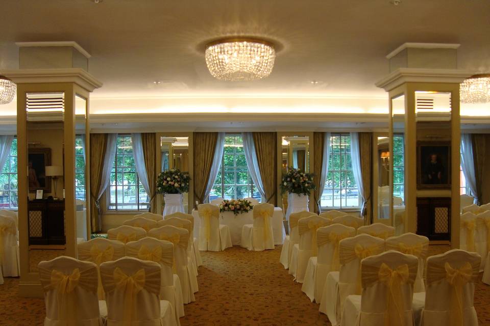 Grosvenor House Ivory Linen Chair Covers with Pale Gold Organza Sashes