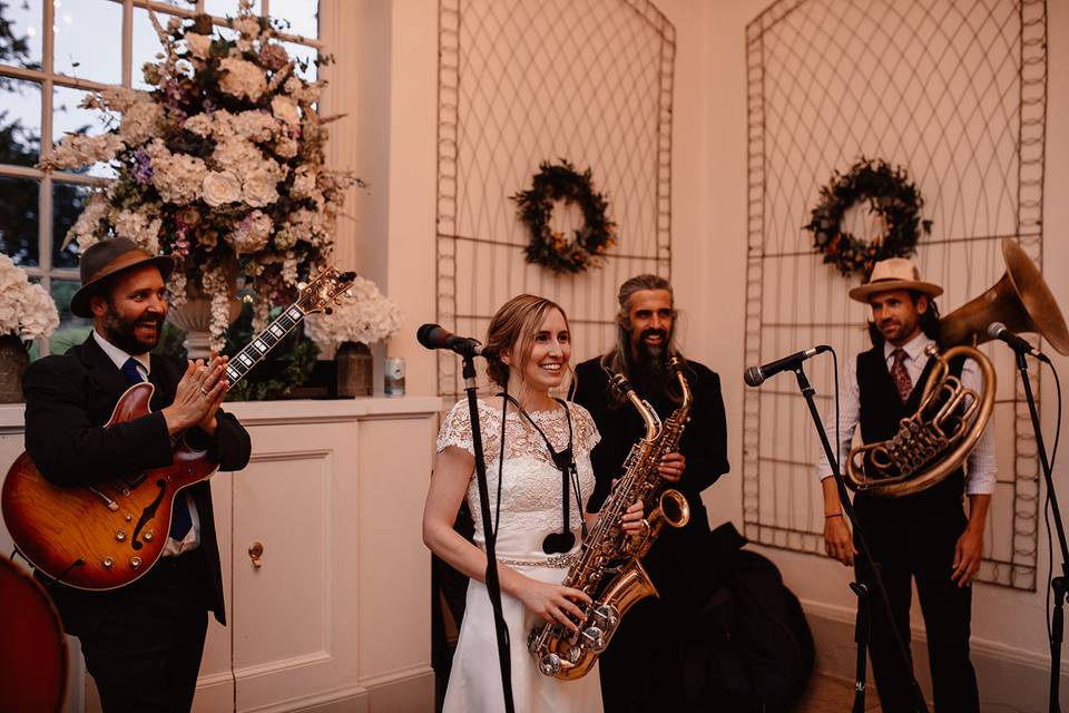 Bride playing with the band