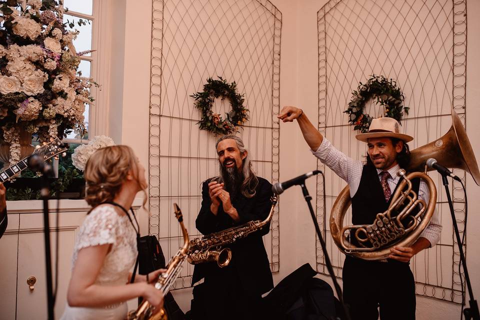 Bride playing with tha band