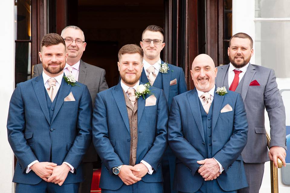 Proud groom and male party