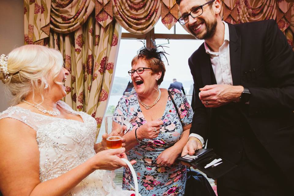 Bride and guest enjoying the show