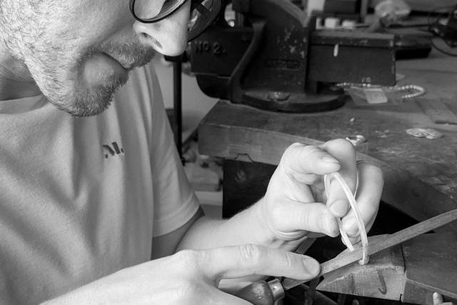 Tom working
