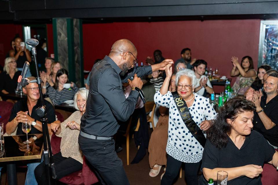 Guests dancing at live show