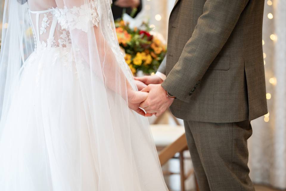 Ceremony holding hands