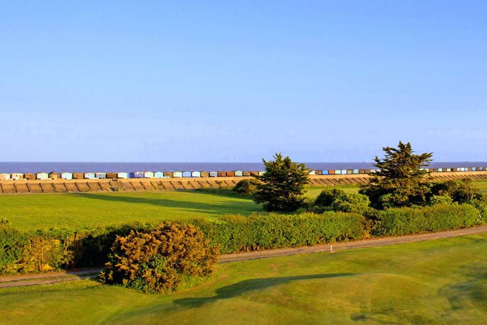 Across the course to beach hut