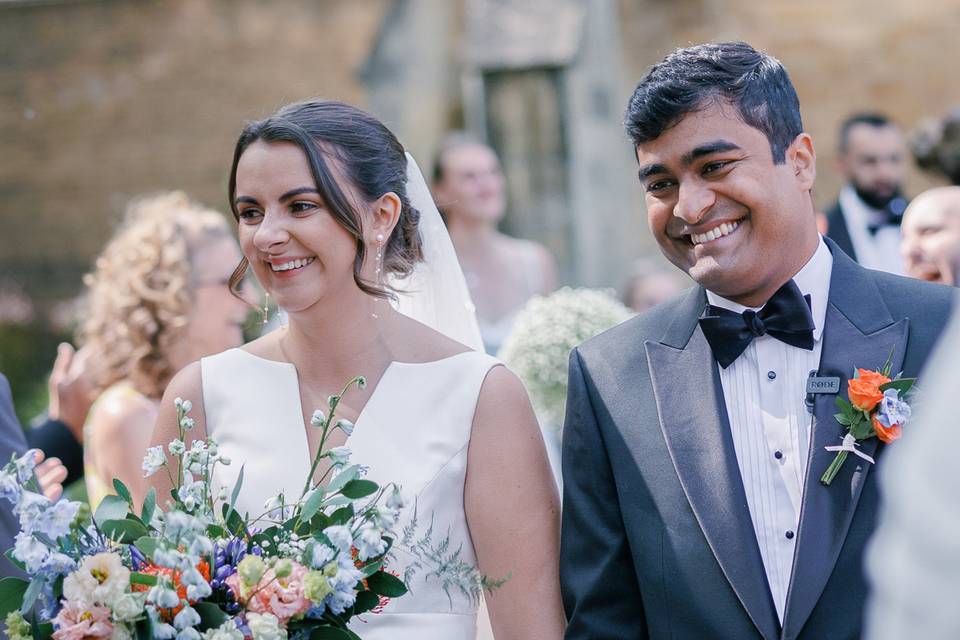 Married walking down aisle