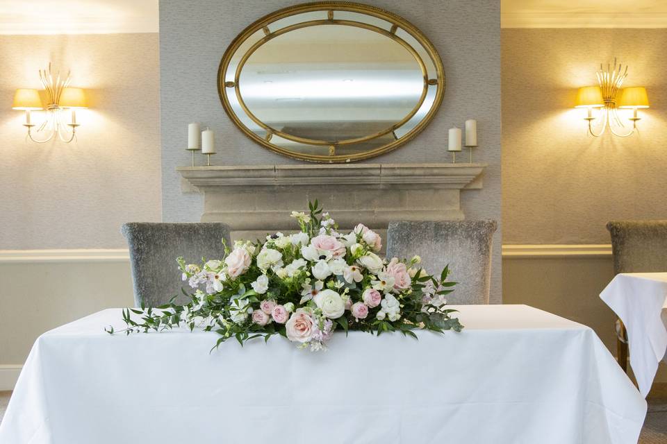 Floral arrangements on table